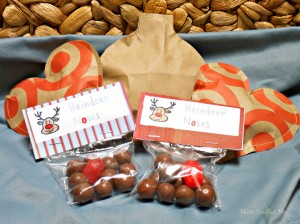 Use leftover Halloween candy yo make paper bag candy pouches and reindeer noses for Christmas stockings