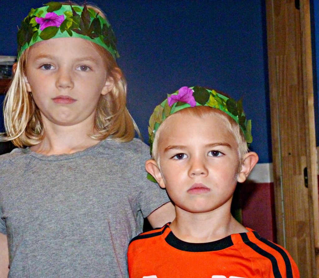 ittle Olympians with olive leaf crowns